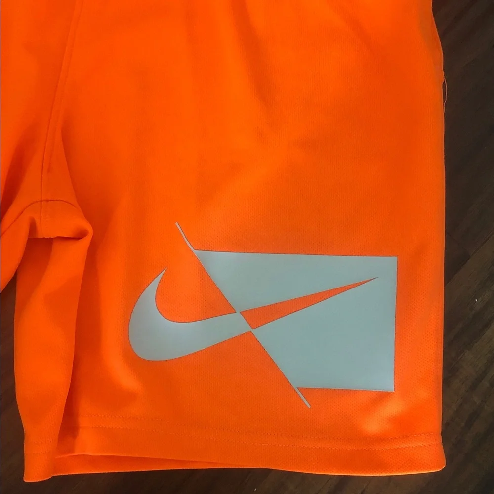 Nike boys Bright Orange Athletic Shorts with Reflective Logo